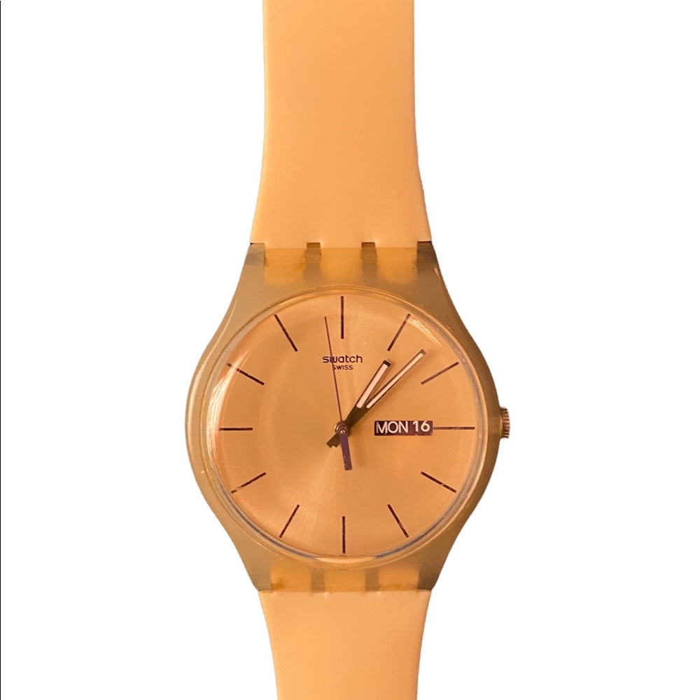 Swatch cream/tan colored silicone watch.  Battery works. Lightweight and pretty!